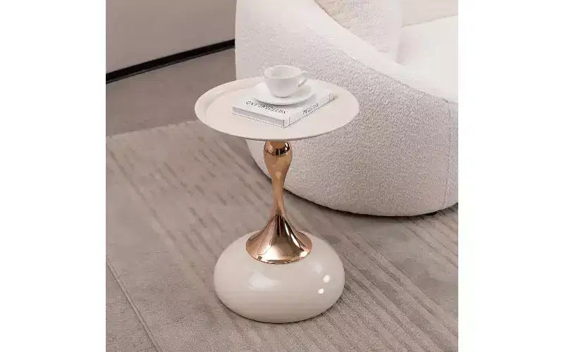 Tavolino rotondo a piedistallo con coda di sirena